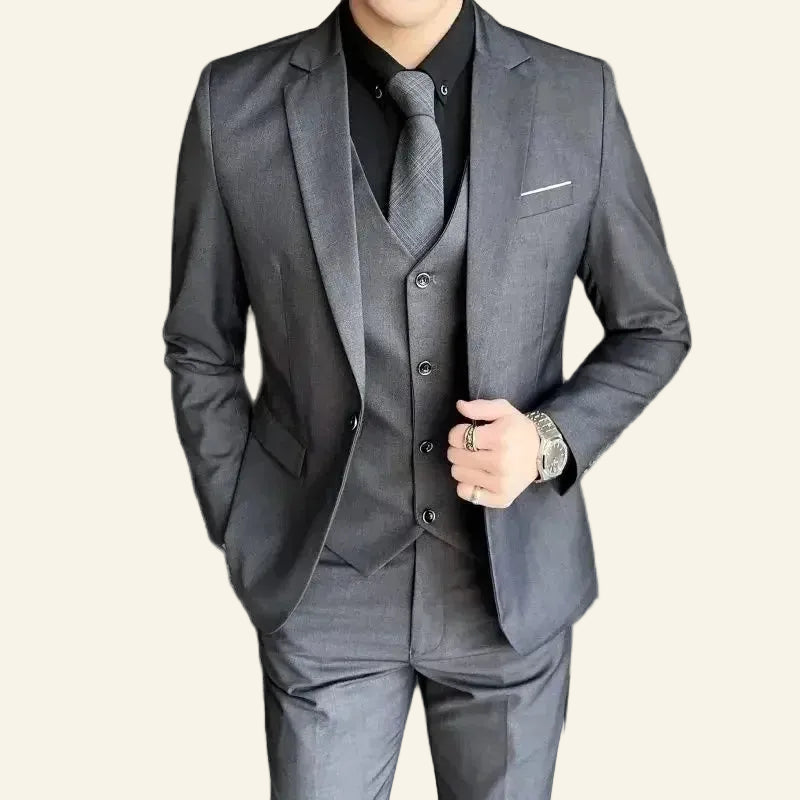 Gray suit with vest and tie  