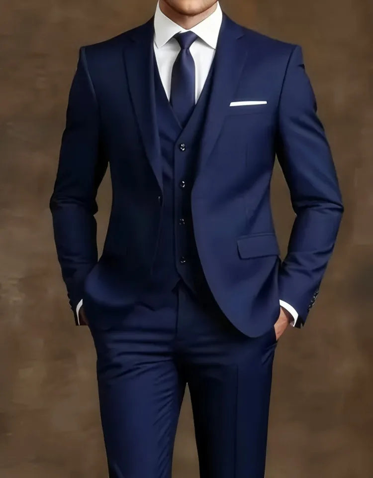 Blue suit with a white shirt and navy tie 