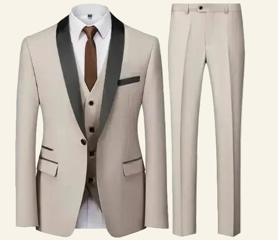 Beige suit with black lapels and brown tie  