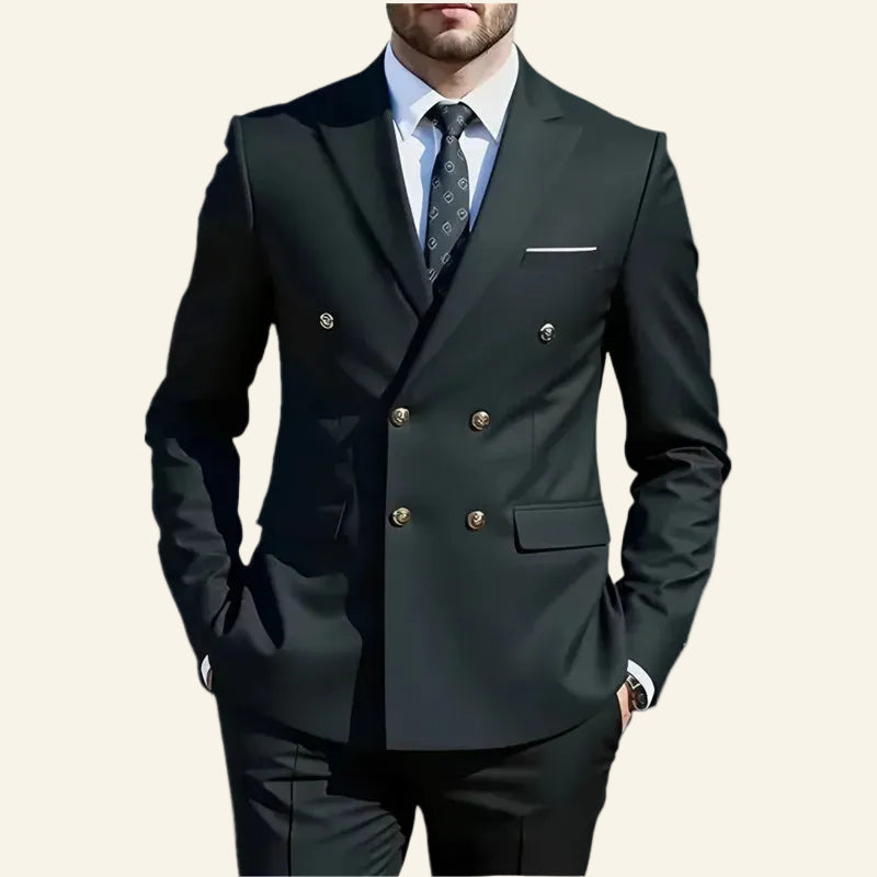 Dark gray suit with white shirt and patterned tie  