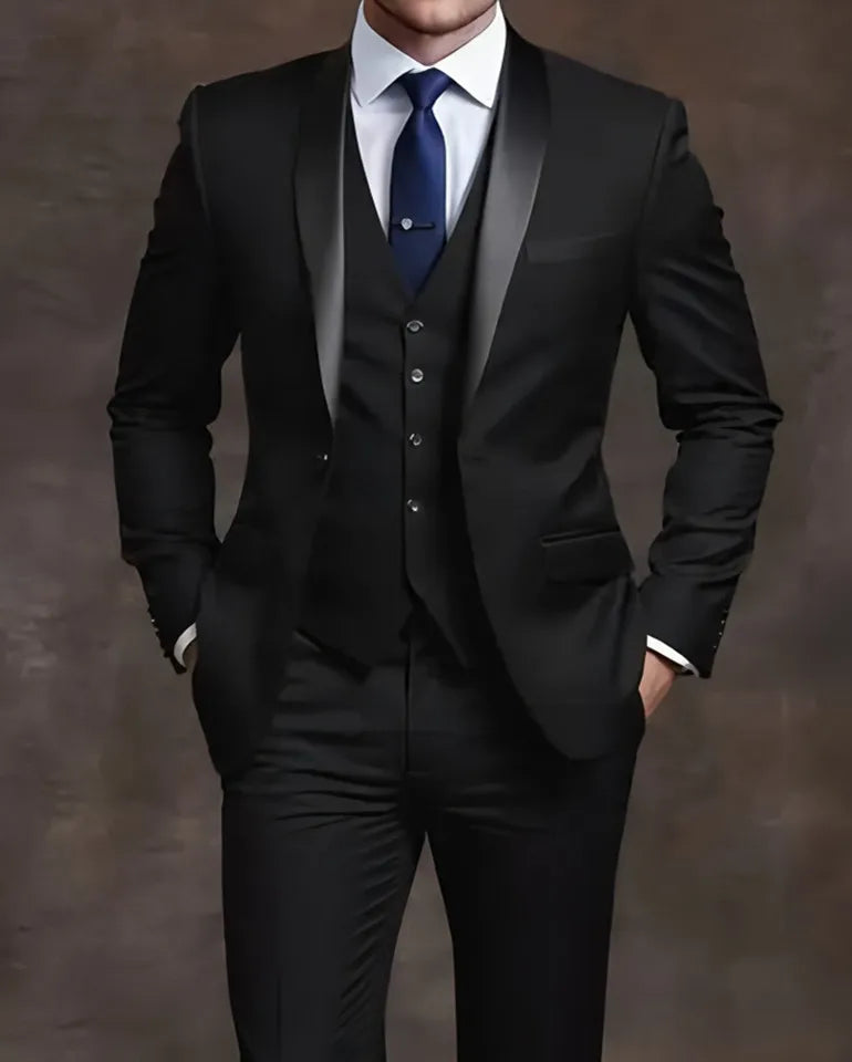 Black suit with a white shirt and blue tie 